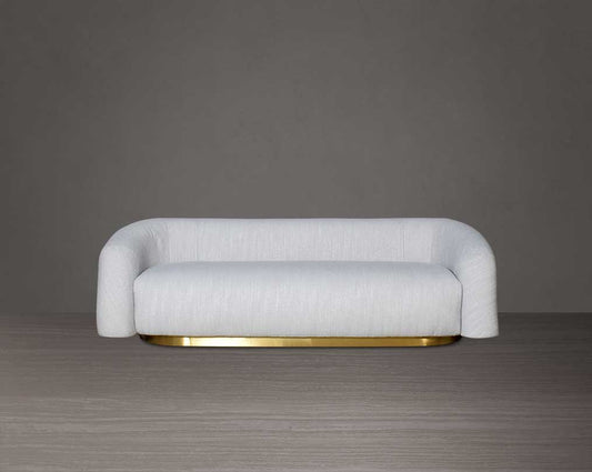 This modern chic 3 sofa in soft form upholstered in high-quality fabric crafted like soft bun with puffy rounded/ tubular back & armrest with stainless steel velvet brushed gold base is a design