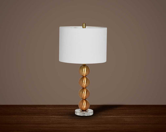 Table lamp white colour with metallic gold and glass decorative base with translucent fabric shade.
