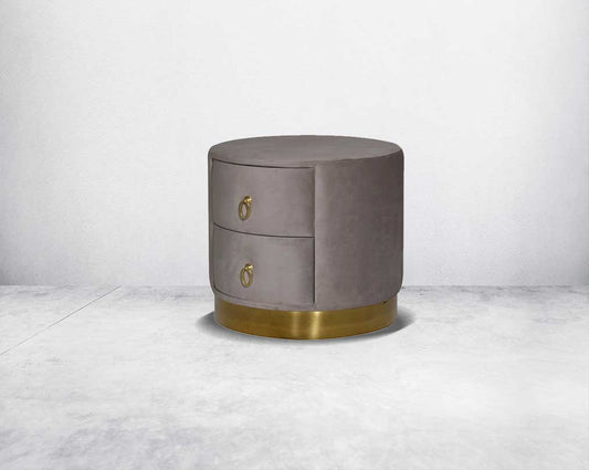 The gorgeous & fully upholstered bedside table c 2 spacious drawers with gold-plated stainless steel handles & base side view