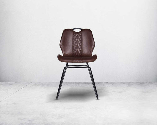 This soft, cushioned dining chair features an extraordinary contemporary design with tufted back and cushioned seat with metal legs front view