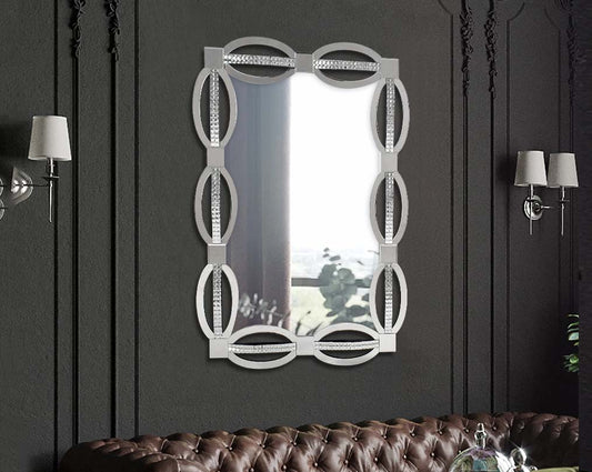 Rectangular wall mirror with silver mirror border with crystal effect in ornamental design. with sofa