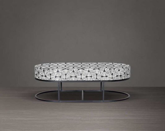 This gorgeous black and white inlay coffee table in floral pattern with a black metal base is a perfect statement piece in your living room. It is a masterwork in inlay in an elaborate pattern.