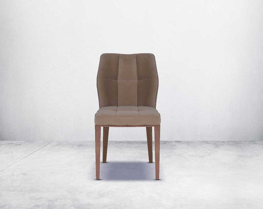 Dining chair upholstered in velvet fabric front with high polished rose gold stainless steel legs.