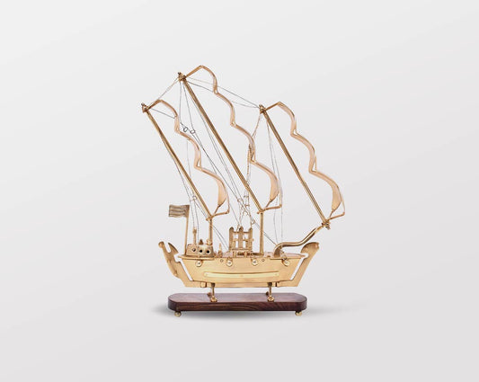 Decorative ship in antique gold and sheesham wood base. small