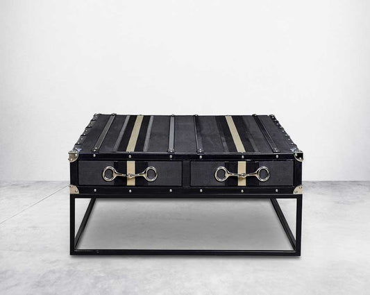 This coffee table inspired by the vintage trunk design motif makes a true focal point in any in modern, contemporary or eclectic decor front view