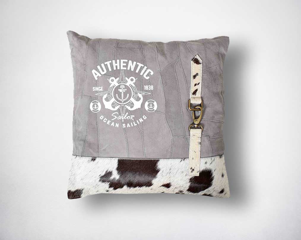 Grey & black recycled suede leather & hair on cushion with embellishments.