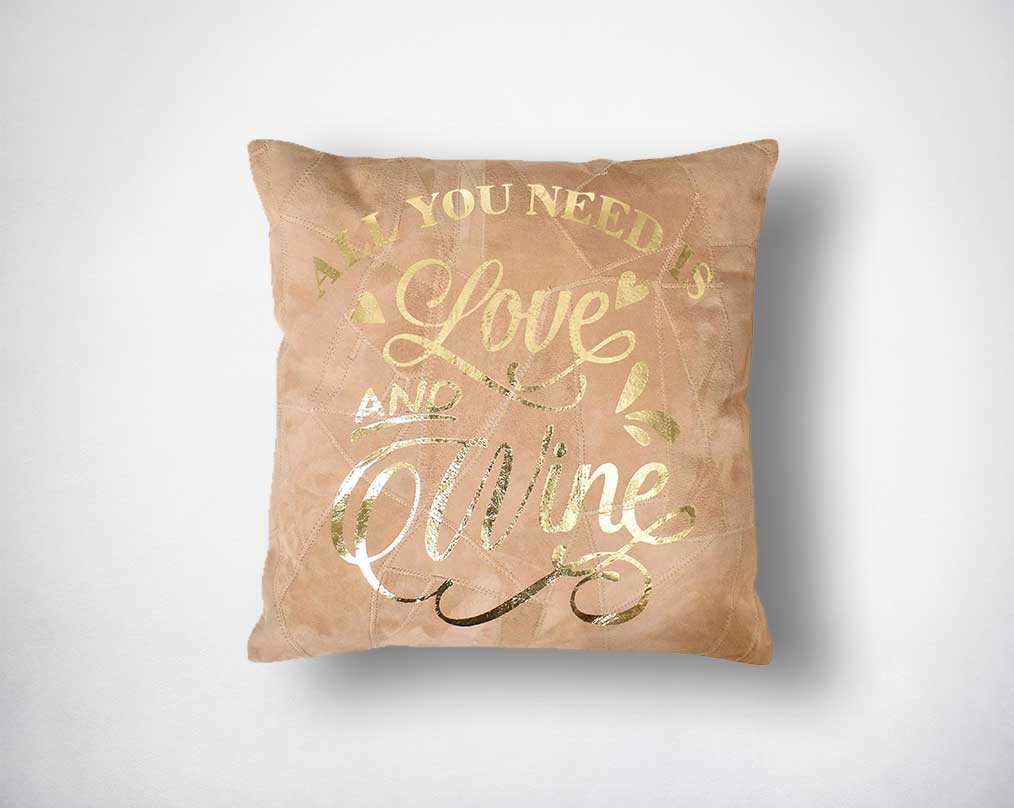 Camel recycled suede leather cushion with gold foil.