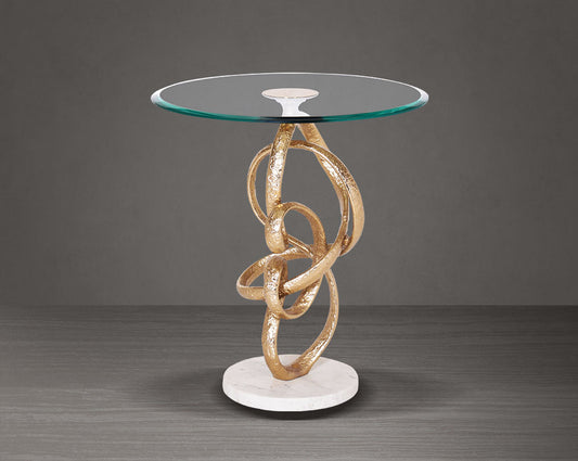 This artful gold accent end table glass top with an amorphously shaped high polished gold pedestal & white marble base.