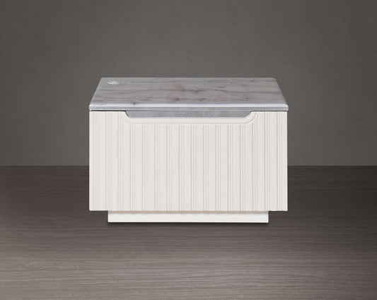The bedside table comes with front view a marble finish top & lacquered in high gloss with a spacious drawer with a cream finish handle & base.