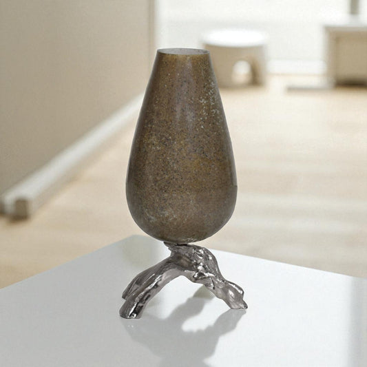 Decorative vase with a textured design on a white surface