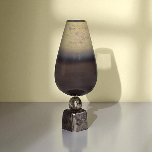 Decorative lamp with a gradient shade on a neutral background