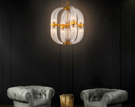A traditional pendant light gets a glamorous upgrade in this four-light chandelier! Crafted of metal in brass finish, this fixture features an open orb frame composed of clear glass faceted prisms. with sofa