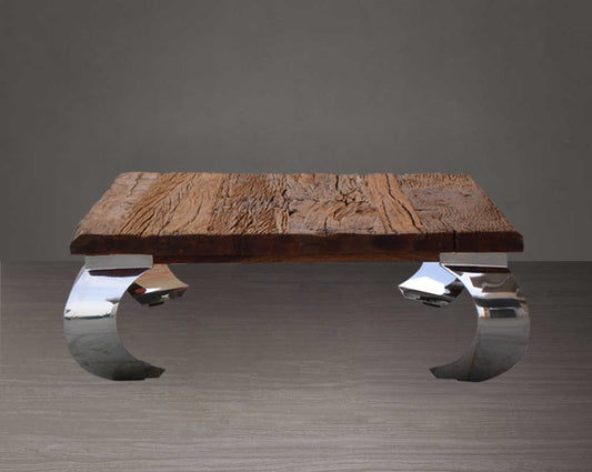 Coffee table with sleeper wood top which has been recycled from railway tracks in a rustic and natural finish with stainless steel base.