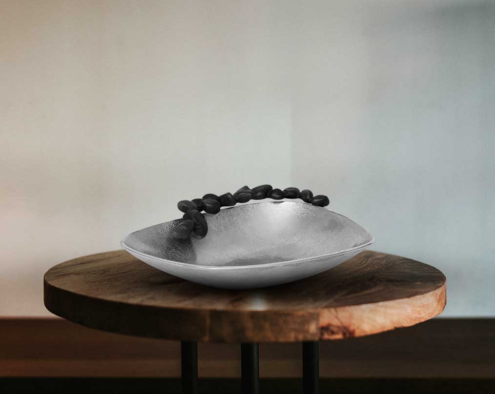 This aluminium platter finished in nickel & grey brings a rich contemporary look to your living or dining room with dining table