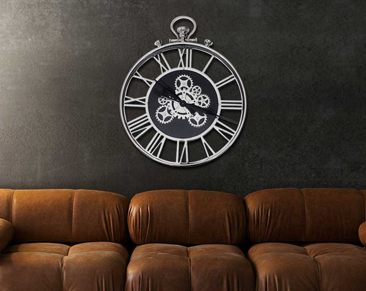 Nickel round wall clock with sofa set in roman numerals