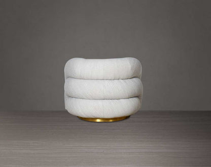 This modern chic 1 sofa back with  in soft form upholstered in high-quality fabric crafted like soft bun with puffy rounded/ tubular back & armrest with stainless steel velvet brushed gold base is a design