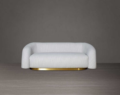 This modern chic 2 sofa in soft form upholstered in high-quality fabric crafted like soft bun with puffy rounded/ tubular back & armrest with stainless steel velvet brushed gold base is a design