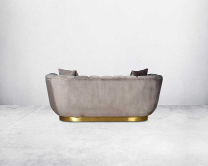 This gorgeous neo-classic 2  seater back sofa is upholstered in high-quality velvet fabric with a vertical quilted backrest that accentuates simplicity and comes with 6 beautiful cushions to compliment.