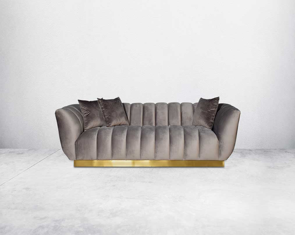 This gorgeous neo-classic 3 seater sofa is upholstered in high-quality velvet fabric with a vertical quilted backrest that accentuates simplicity and comes with 6 beautiful cushions to compliment.