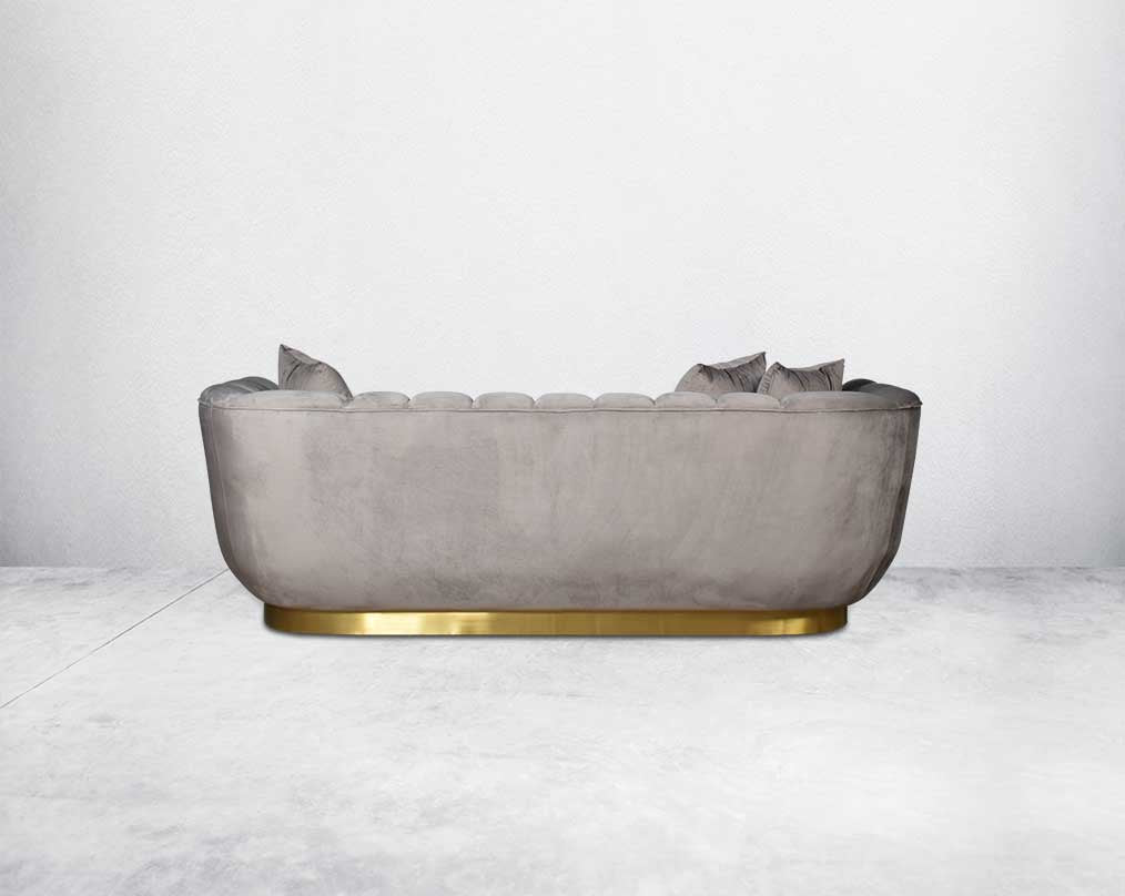 This gorgeous neo-classic 3 seater  back sofa is upholstered in high-quality velvet fabric with a vertical quilted backrest that accentuates simplicity and comes with 6 beautiful cushions to compliment. 