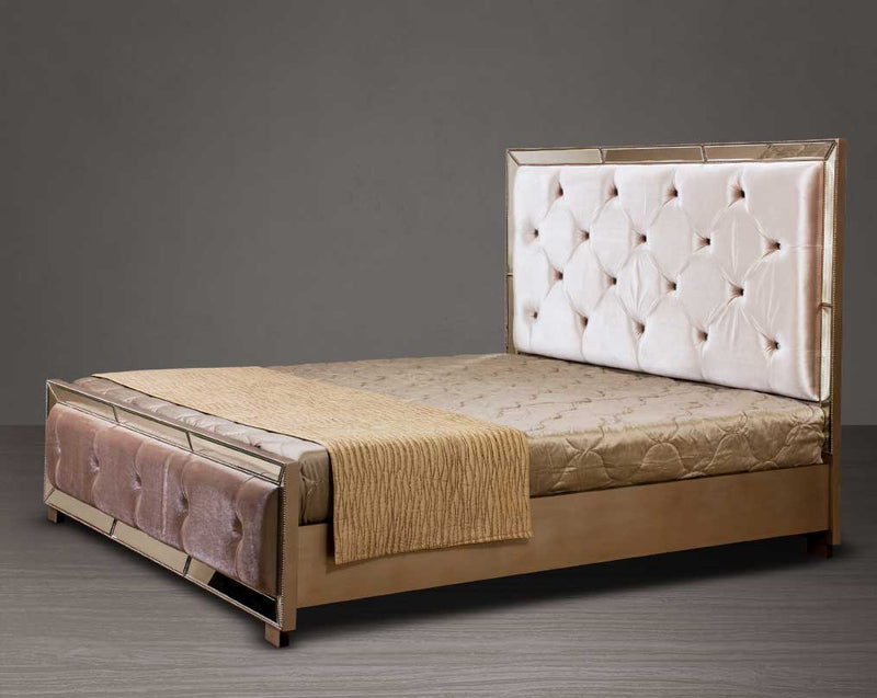 Bed in king size with high back upholstered and tufted in fabric in mirror and antique silver.