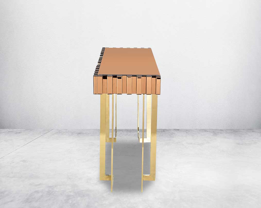 The table has one drawer with rectangular wall mirror with gold mirror border & stainless steel frame in rich contemporary design 