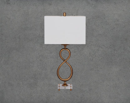 Table lamp in decorative metal and crystal base with translucent fabric shade