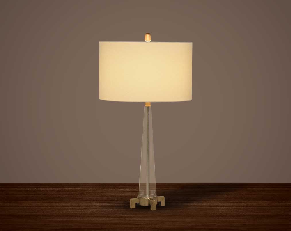 Table lamp with crystal and bronze metal decorative base with translucent fabric shade in ultra modern design