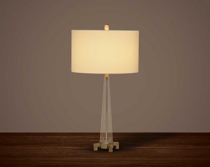 Table lamp with crystal and bronze metal decorative base with translucent fabric shade in ultra modern design