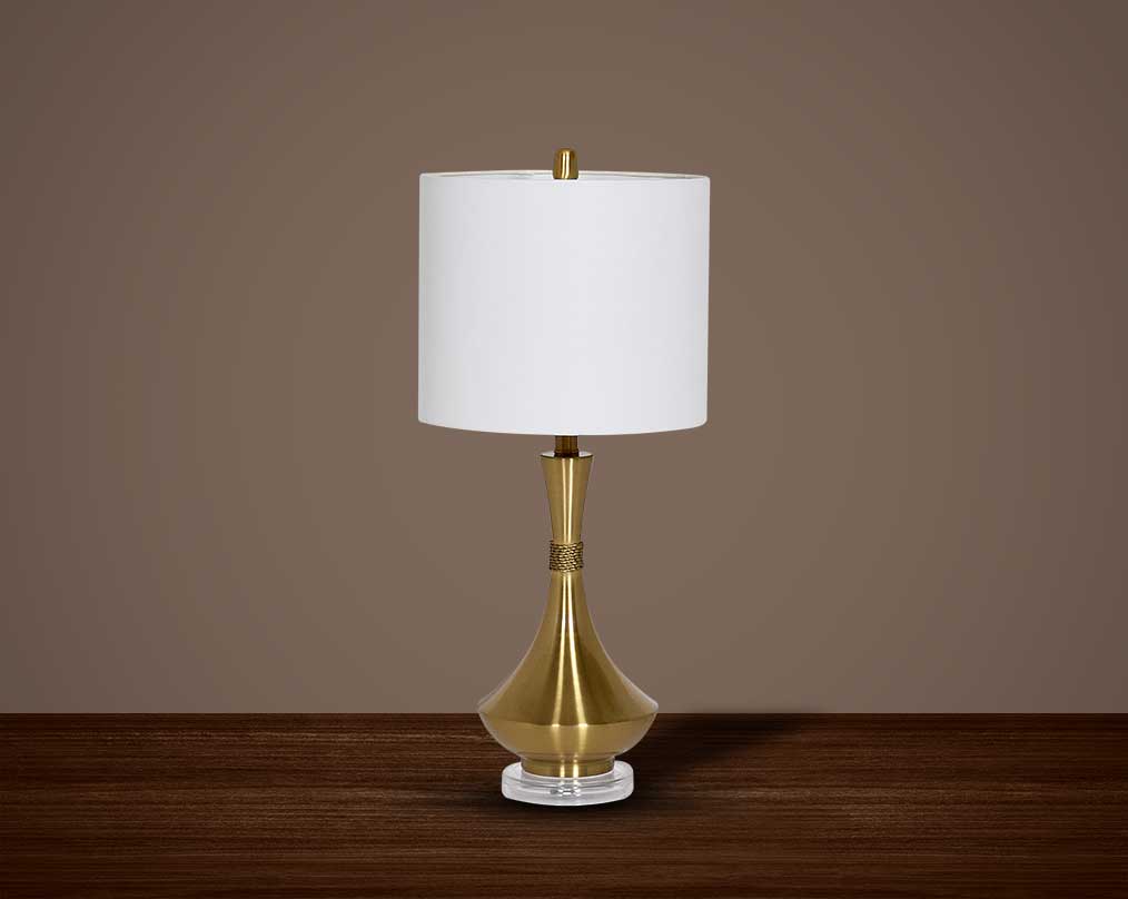 Table lamp in metallic gold and crystal with translucent fabric shade.
