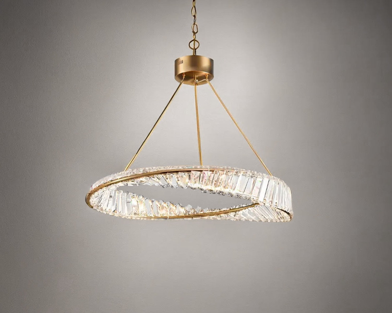 Art deco chandelier with crystal prism fringe adorned with champagne gold metal band evokes the boldness and glamour of the era