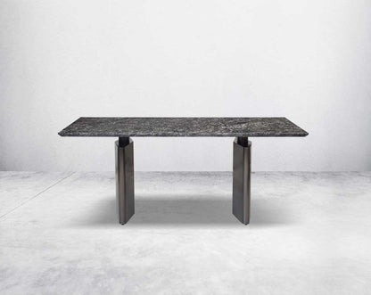 This 6 & 8 seater minimalistically designed dining table with grey marble top is an embodiment of contemporary chicness. This dining table in geometrical hexagonal base comes in glossy gunmetal finish in a contemporary design.