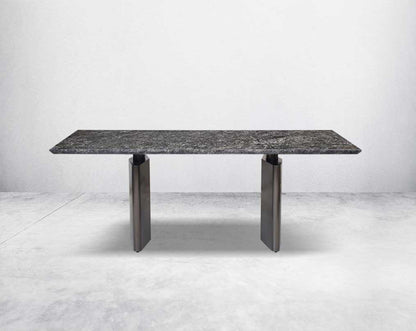 This 8-seater minimalistically designed dining table with grey marble top is an embodiment of contemporary chicness
