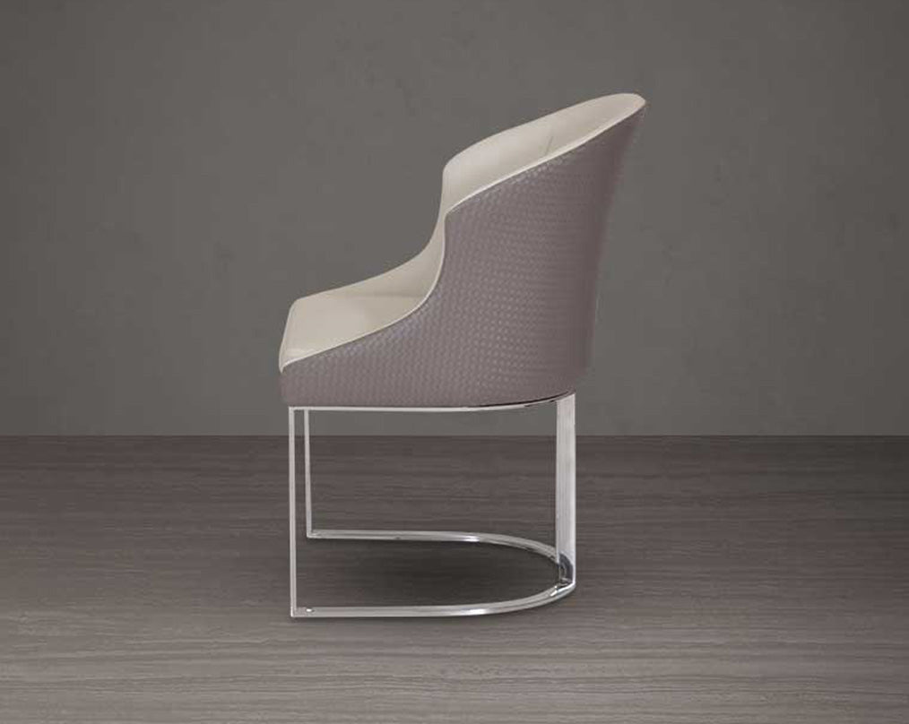 This dining chair stands resplendent with a rich contemporary look. It is crafted in faux leather upholstery and comes in two colours with glossy, silver-plated, stainless steel legs