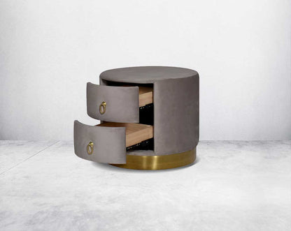 The gorgeous & fully upholstered bedside table  open 2 spacious drawers with gold-plated stainless steel handles & base.