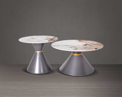 This round coffee table is a captivating composition of a round white & brown ceramic top & conical metal base front view