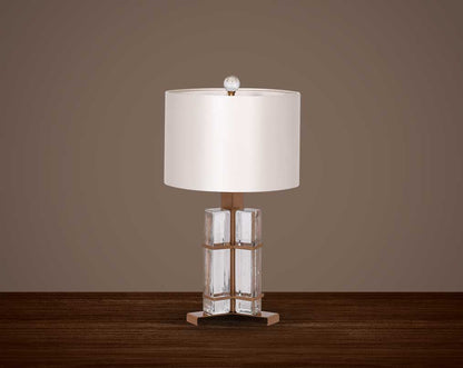 Table lamp in coffee bronze and glass with white  translucent fabric shade in ultra modern design..