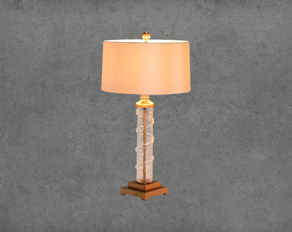 Table lamp in coffee bronze and glass with translucent fabric shade in ultra modern design.