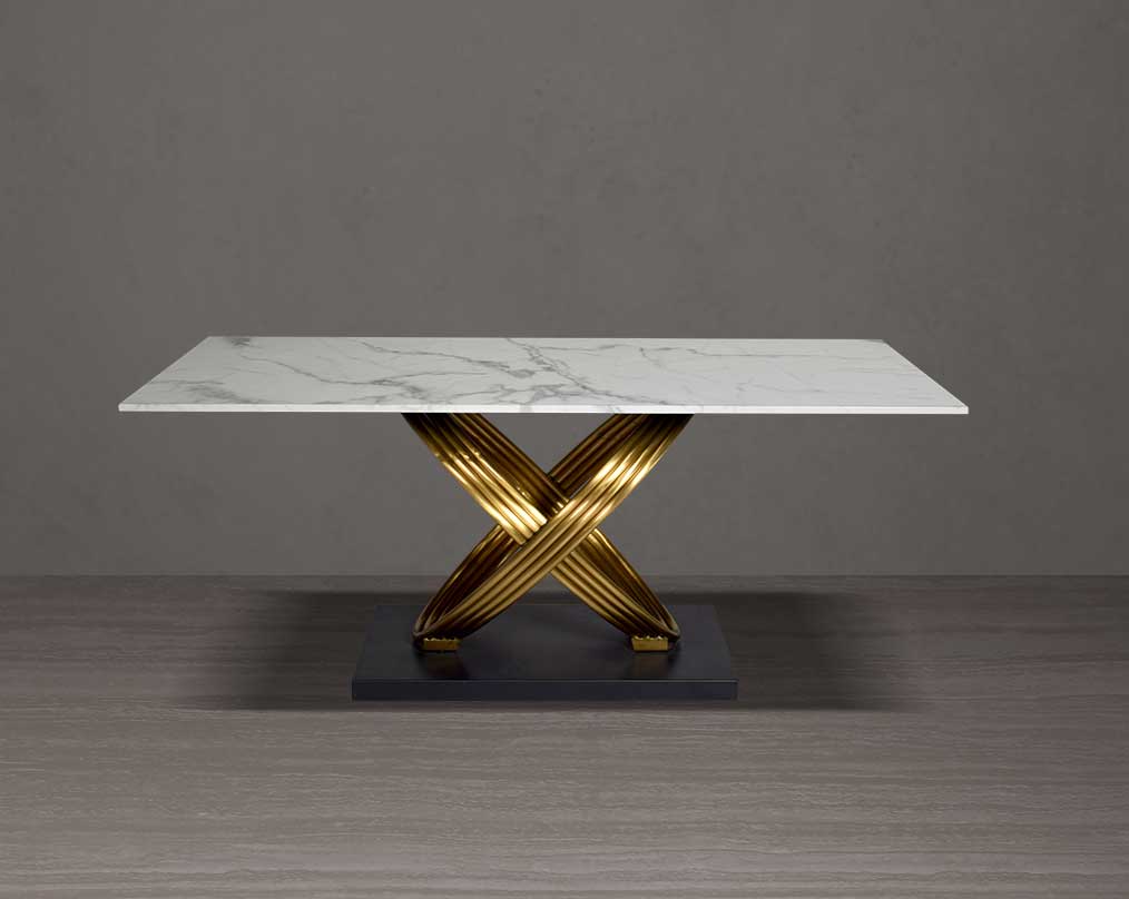 This voguish 6 seater rectangular dining table is cast with a white faux marble top & matt gold plated stainless steel front view.