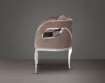 Leisure arm chair in fabric with stainless steel frame and legs.