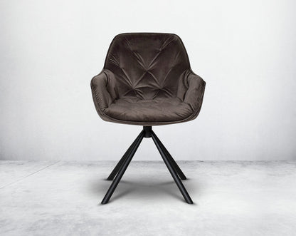 This soft, cushioned dining chair front with features an extraordinary contemporary design with tufted back and cushioned seat with metal legs.It is upholstered in velvet fabric which will certainly elevate the style of your space.