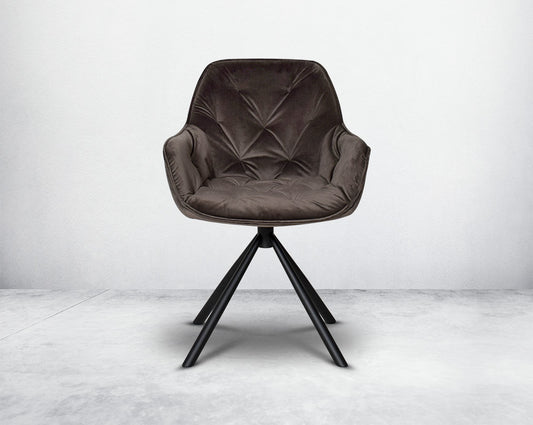 This soft, cushioned dining chair front with features an extraordinary contemporary design with tufted back and cushioned seat with metal legs.It is upholstered in velvet fabric which will certainly elevate the style of your space.