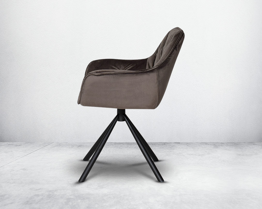 This soft, cushioned dining chair features an extraordinary contemporary design with tufted back and cushioned seat with metal legs.It is upholstered in velvet fabric which will certainly elevate the style of your space.