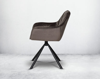 This soft, cushioned dining chair features an extraordinary contemporary design with tufted back and cushioned seat with metal legs.It is upholstered in velvet fabric which will certainly elevate the style of your space.