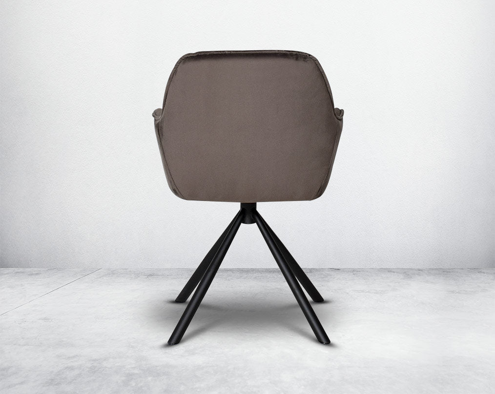 This soft, cushioned dining chair back with features an extraordinary contemporary design with tufted back and cushioned seat with metal legs.It is upholstered in velvet fabric which will certainly elevate the style of your space.