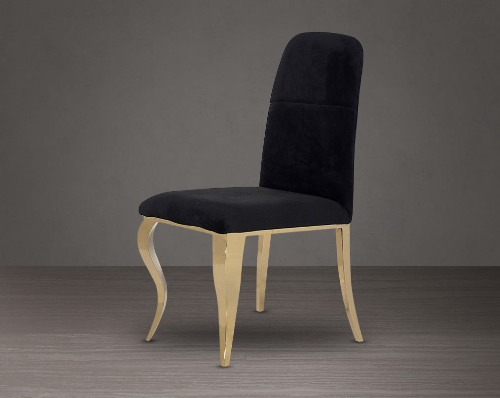 Dining chair upholstered in fabric with gold plated stainless steel legs.