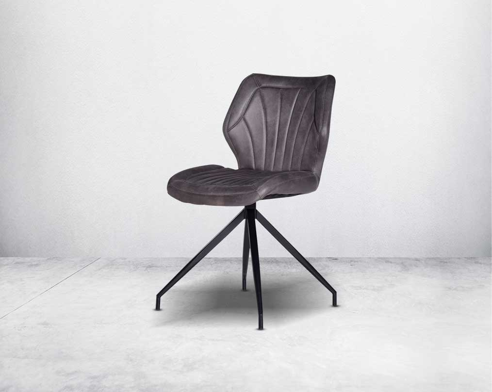 This soft, cushioned dining chair features an extraordinary contemporary design with tufted back and cushioned seat with metal legs