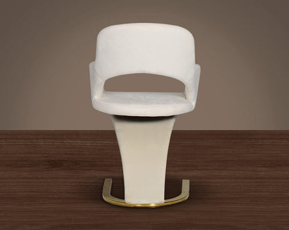 This dining chair with back  features an extraordinary design with a backrest and a cushioned seat upholstered in velvet. It has a horseshoe motif gold plated metal base which adds a modern glamorous look to any space
