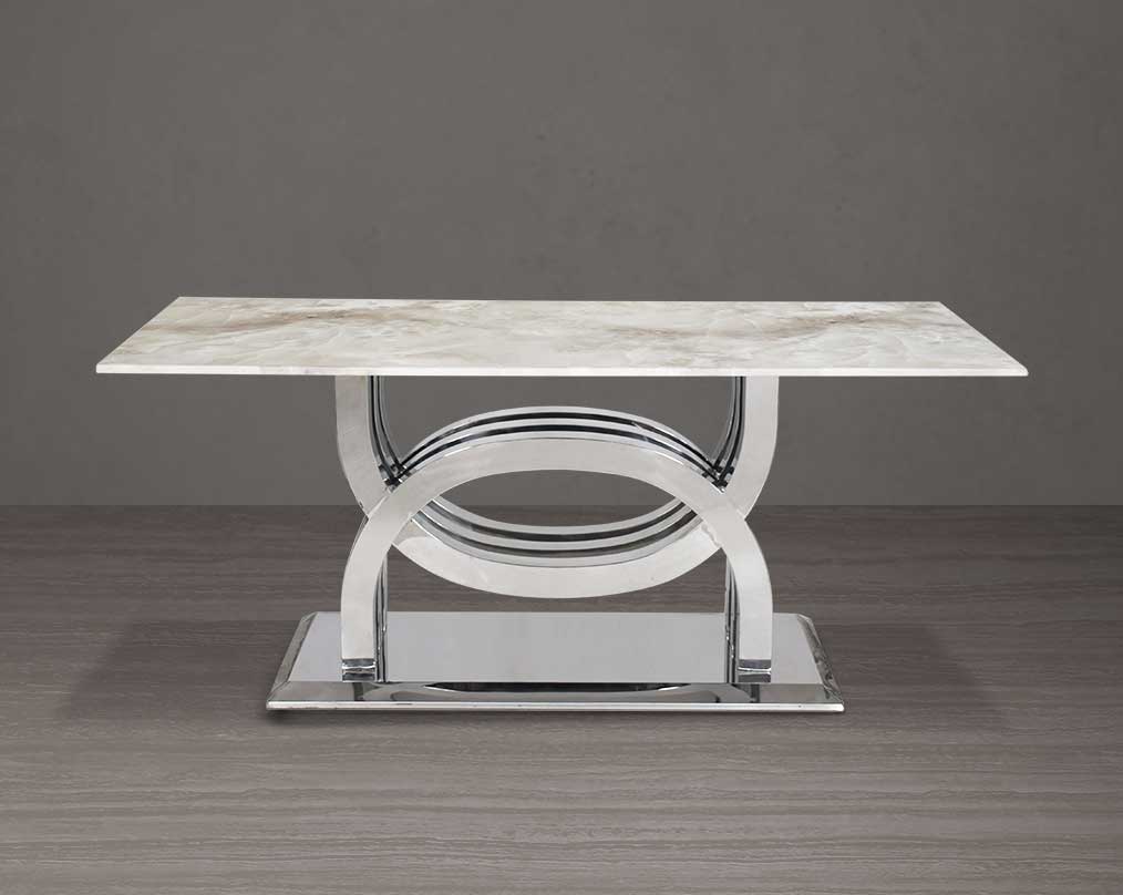 8 seater rectangular dining table with marble top comes with an artful stainless steel base.