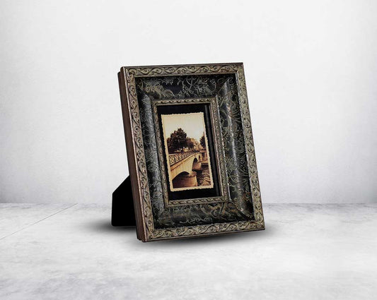 Photo frame in wood with stone embellished decorative frame in modern classic design.